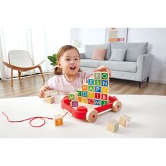 Blocs de construction de lettres dans un chariot à tirer