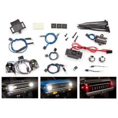 LED light set, complete with power su pply (contains headlights, tail light s, side marker lights, & distribution