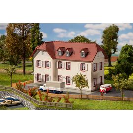 Maison en angle à deux étages