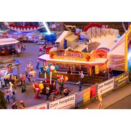 Stand de friandises et sculpteur de ballons