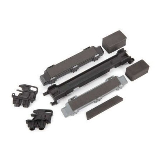 Battery hold-down/ mounts (front & re ar)/ battery compartment spacers/ foa m pads (fits Maxx with extended chass