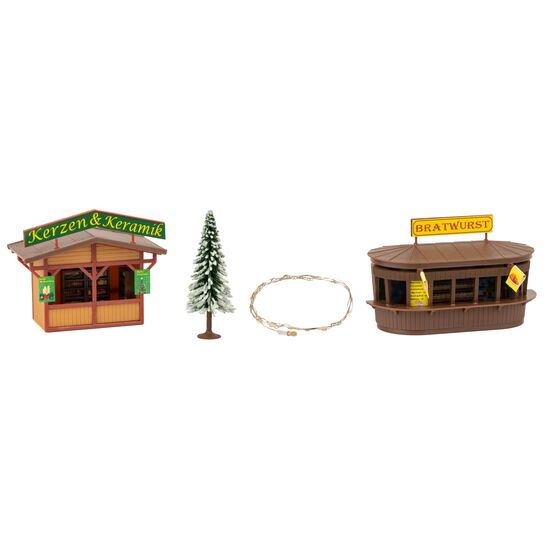 2 Weihnachtsmarktbuden mit beleuchtetem Weihnachtsbaum, 2 image